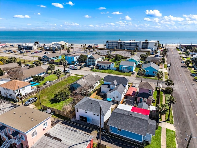 birds eye view of property with a water view and a residential view