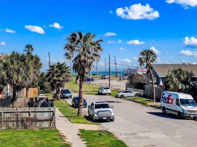 view of street with street lights and sidewalks