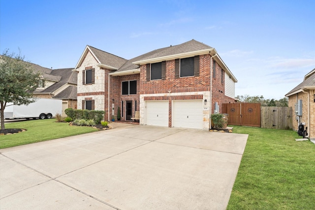 view of front of home featuring a front lawn, brick siding, a garage, a gate, and driveway