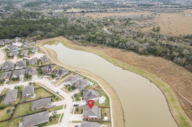 bird's eye view featuring a water view and a residential view