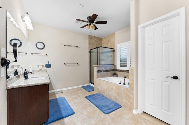 full bath featuring a garden tub, vanity, ceiling fan, tile patterned floors, and a stall shower