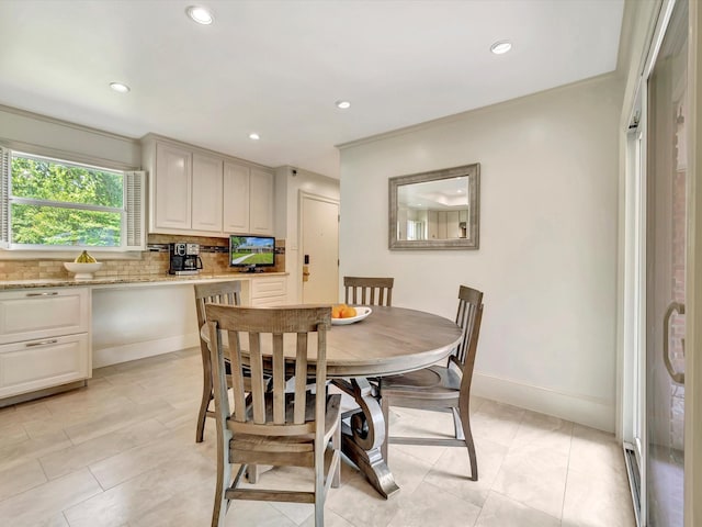 dining area featuring recessed lighting, baseboards, and light tile patterned floors