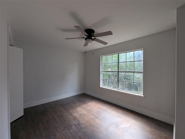 804 Ward St, Rosenberg, TX 77471 - unfurnished room featuring dark wood-style flooring, ceiling fan, and baseboards