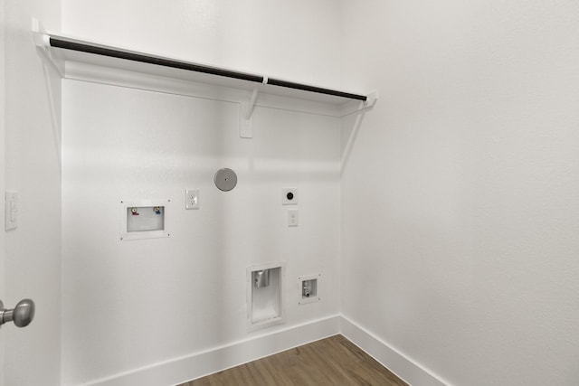 2219 Inglenook Grove Dr, Katy, TX 77493 - laundry room with baseboards, hookup for an electric dryer, dark wood-style flooring, washer hookup, and hookup for a gas dryer