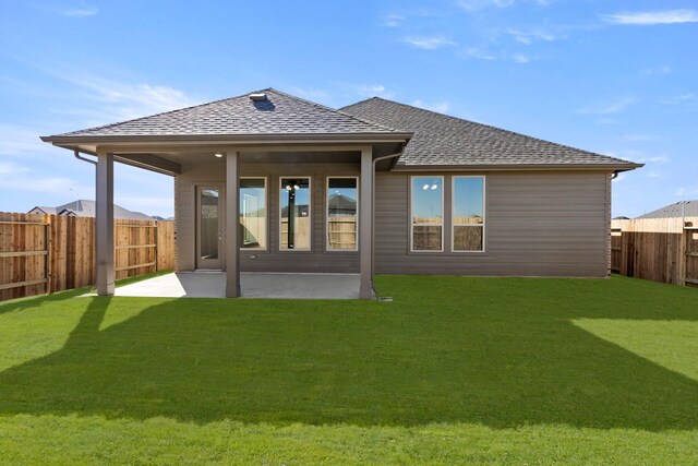 2219 Inglenook Grove Dr, Katy, TX 77493 - back of house with roof with shingles and a patio