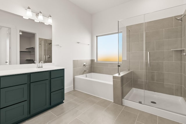 2219 Inglenook Grove Dr, Katy, TX 77493 - bathroom featuring a stall shower, tile patterned floors, a garden tub, and vanity