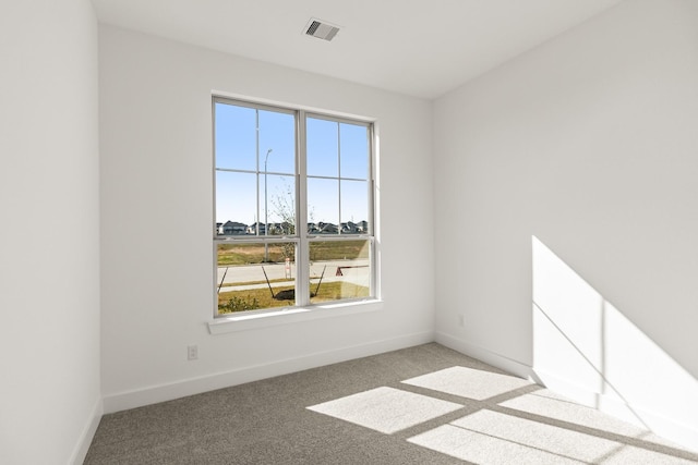 2219 Inglenook Grove Dr, Katy, TX 77493 - empty room with healthy amount of natural light, carpet, and baseboards