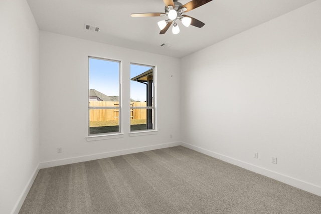 2219 Inglenook Grove Dr, Katy, TX 77493 - empty room with carpet flooring, baseboards, and ceiling fan