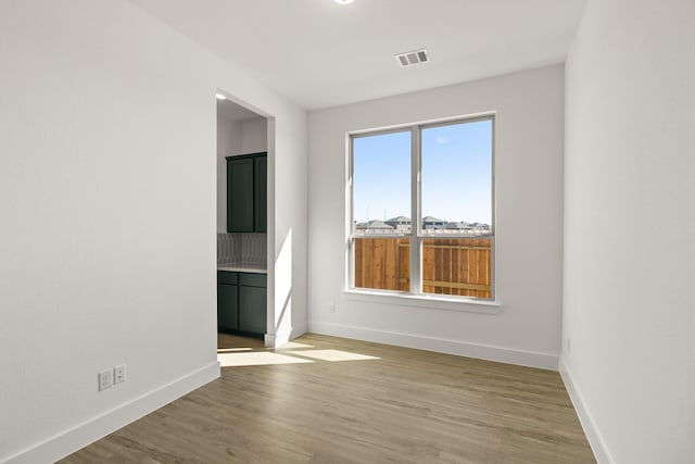 2219 Inglenook Grove Dr, Katy, TX 77493 - empty room with baseboards and wood finished floors