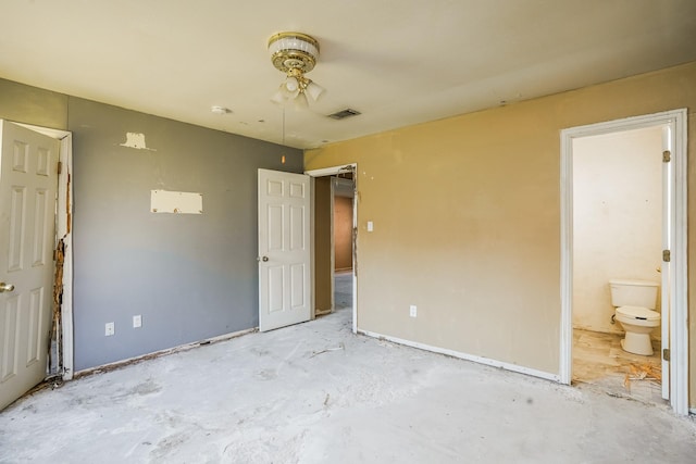 unfurnished bedroom with visible vents and ensuite bathroom