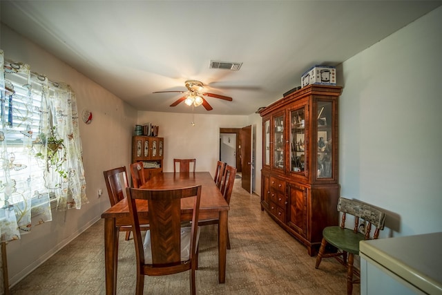 dining room with visible vents and ceiling fan