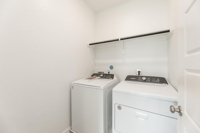 laundry area featuring washer and dryer and laundry area