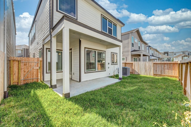 3011 Valley Peak Dr, Houston, TX 77063 - rear view of house with a fenced backyard, a gate, a yard, and a patio area