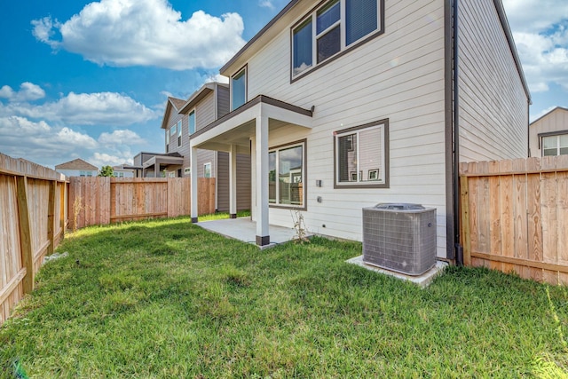 3011 Valley Peak Dr, Houston, TX 77063 - back of house featuring central air condition unit, a patio, a yard, and a fenced backyard