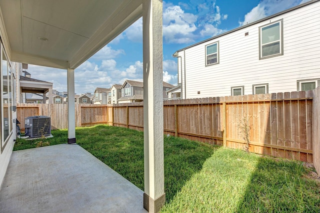 3011 Valley Peak Dr, Houston, TX 77063 - view of yard with central air condition unit, a patio, a residential view, and a fenced backyard