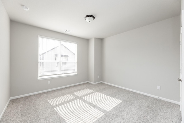 3011 Valley Peak Dr, Houston, TX 77063 - empty room featuring baseboards, carpet, and visible vents