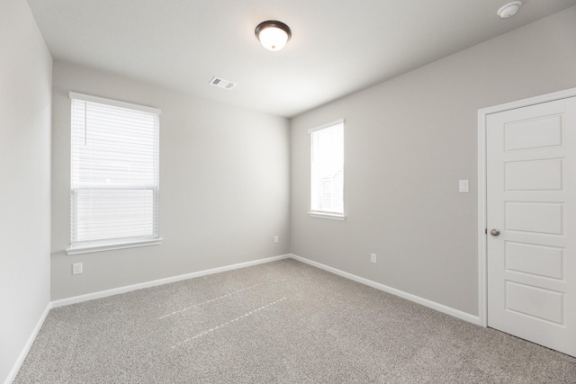 3011 Valley Peak Dr, Houston, TX 77063 - carpeted empty room featuring visible vents and baseboards