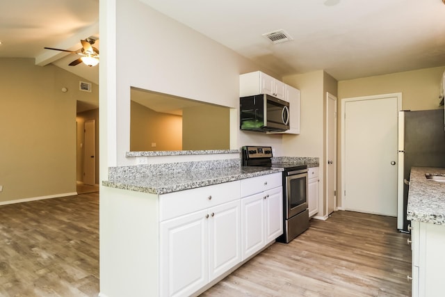 kitchen with white cabinets, ceiling fan, light wood-style floors, stainless steel appliances, and visible vents