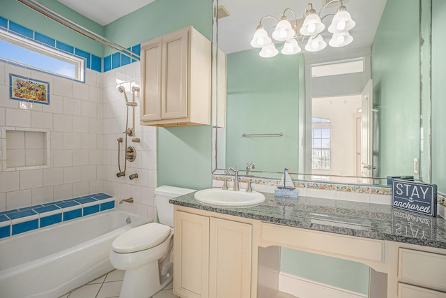 bathroom with vanity, tile patterned flooring, visible vents, toilet, and  shower combination