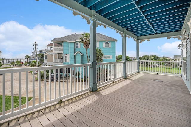 wooden deck with a residential view