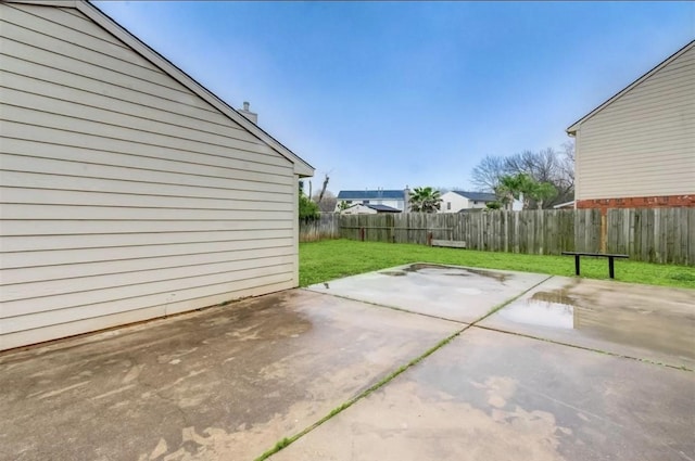 view of patio with a fenced backyard