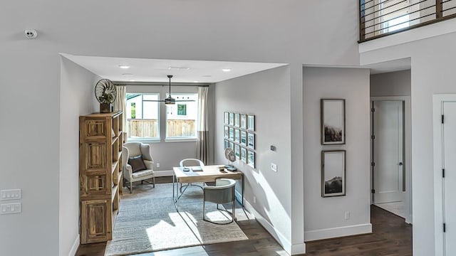 dining space with recessed lighting, baseboards, and dark wood-style flooring