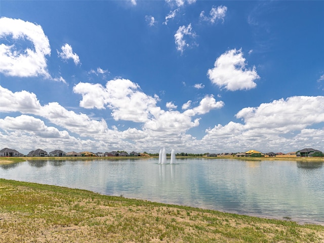 view of water feature with a residential view