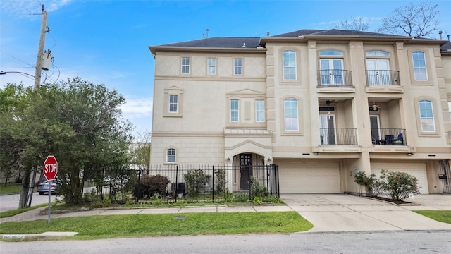 4524 Rose St, Houston, TX 77007 - view of property featuring fence, a balcony, french doors, an attached garage, and driveway