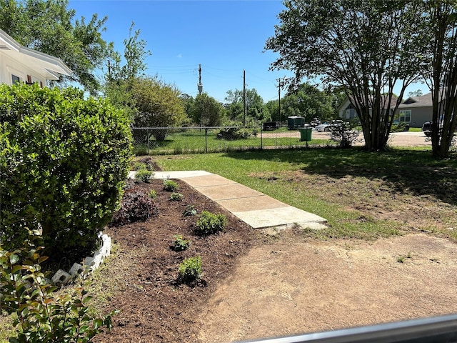 105 Will St, Willis, TX 77378 - view of yard featuring fence