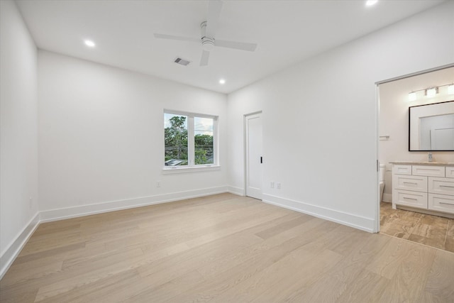 1550 Gardenia Dr, Houston, TX 77018 - unfurnished bedroom with light wood-type flooring, recessed lighting, ensuite bathroom, and baseboards
