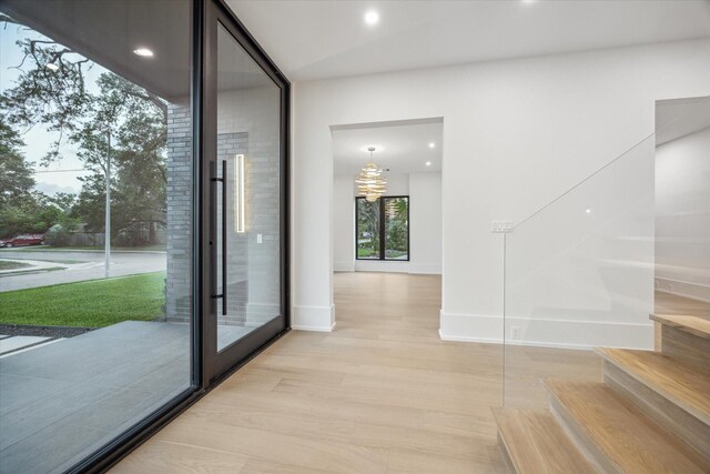 1550 Gardenia Dr, Houston, TX 77018 - interior space with stairs, light wood-style flooring, baseboards, and recessed lighting