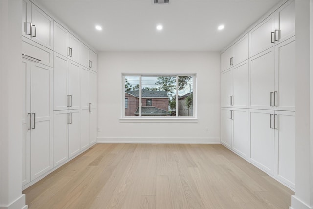 1550 Gardenia Dr, Houston, TX 77018 - unfurnished bedroom with light wood-style floors, recessed lighting, and baseboards