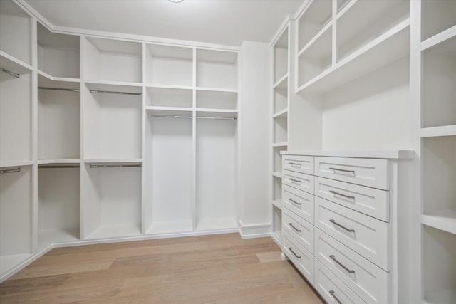1550 Gardenia Dr, Houston, TX 77018 - walk in closet featuring light wood-type flooring