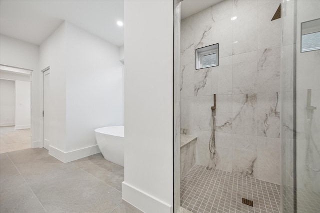1550 Gardenia Dr, Houston, TX 77018 - bathroom with a marble finish shower, a freestanding bath, and recessed lighting