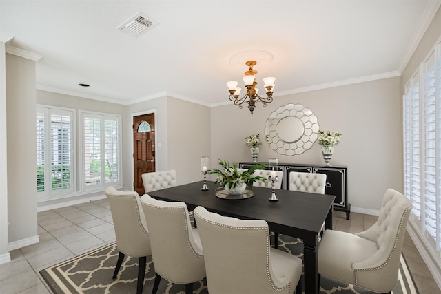 13826 Menasco Ct, Houston, TX 77077 - dining space with a chandelier, healthy amount of natural light, ornamental molding, baseboards, and light tile patterned flooring