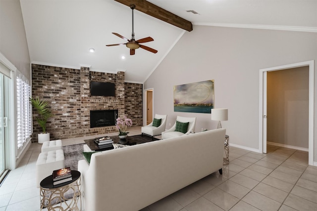 13826 Menasco Ct, Houston, TX 77077 - living room featuring ceiling fan, tile patterned flooring, beam ceiling, plenty of natural light, and a brick fireplace