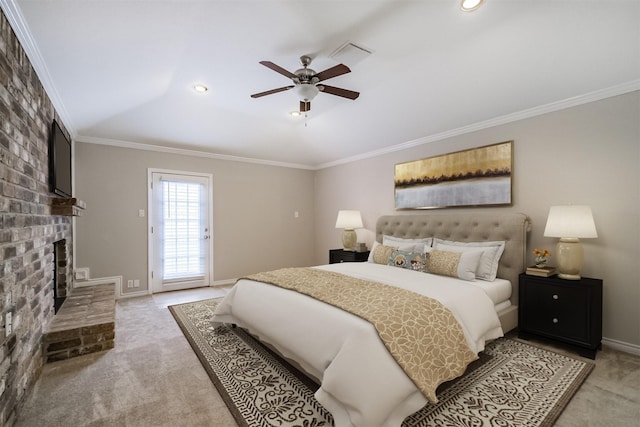 13826 Menasco Ct, Houston, TX 77077 - bedroom with light colored carpet, crown molding, access to exterior, a brick fireplace, and baseboards