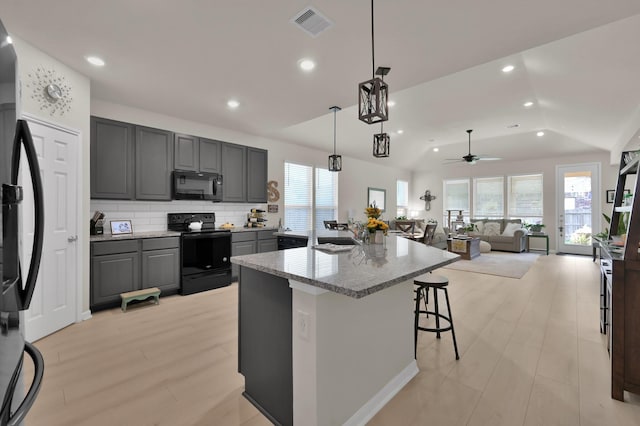 kitchen with visible vents, recessed lighting, gray cabinets, a ceiling fan, and black appliances