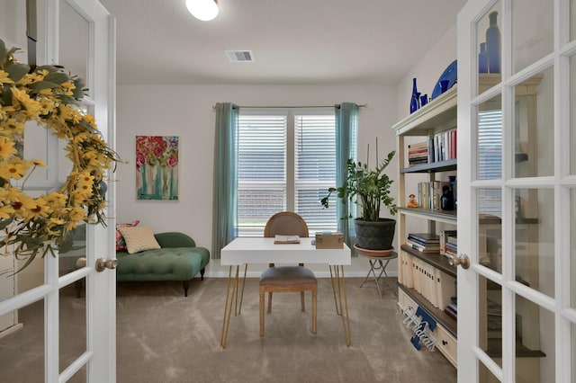 carpeted office featuring french doors and visible vents