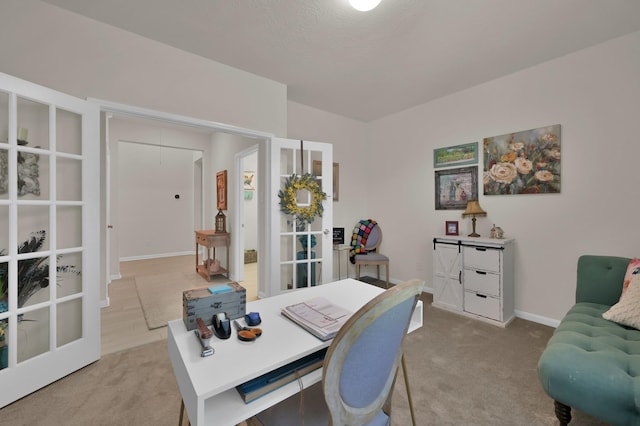 office with baseboards, light carpet, and french doors