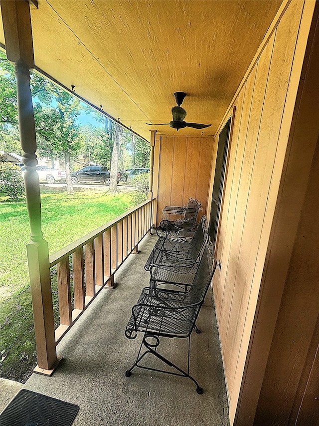 view of patio featuring ceiling fan and covered porch