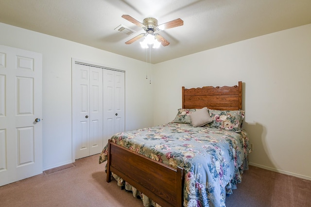 3306 Sycamore Springs Dr, Houston, TX 77339 - carpeted bedroom featuring a closet, baseboards, and ceiling fan