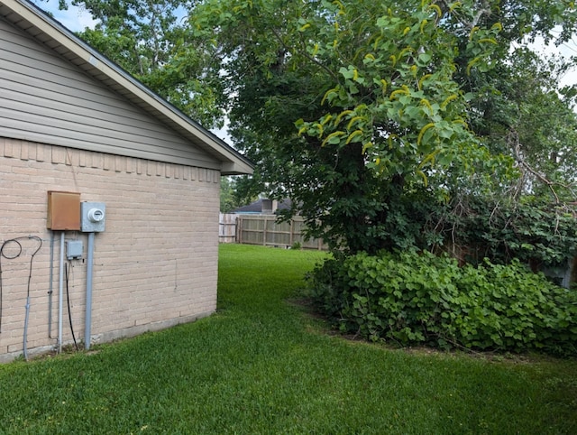 view of yard with fence