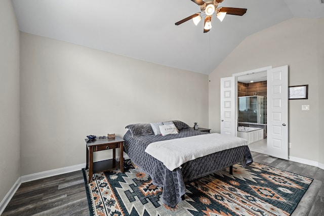 bedroom featuring baseboards, wood finished floors, and lofted ceiling