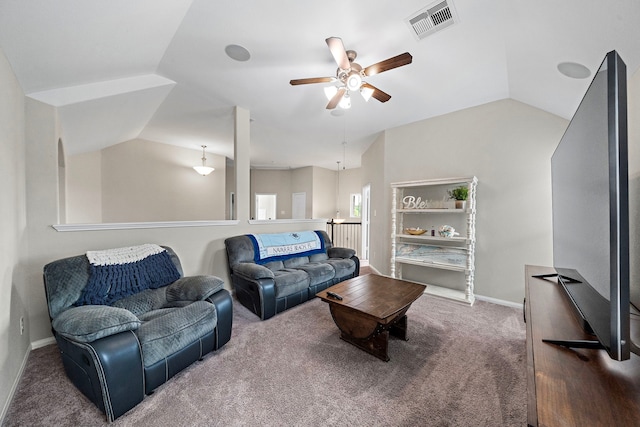 living room with ceiling fan, visible vents, carpet floors, baseboards, and lofted ceiling