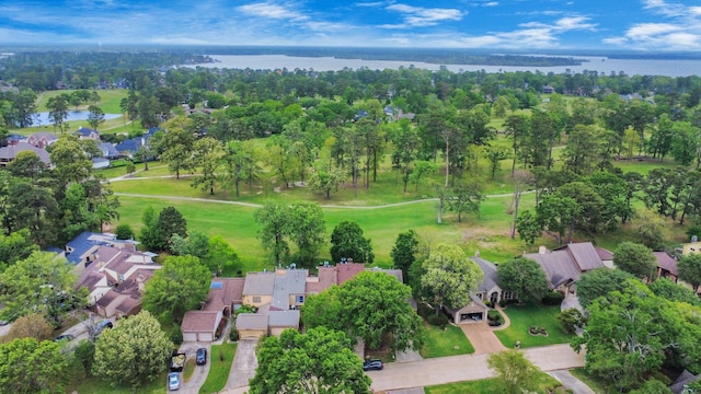 drone / aerial view featuring a residential view and a water view