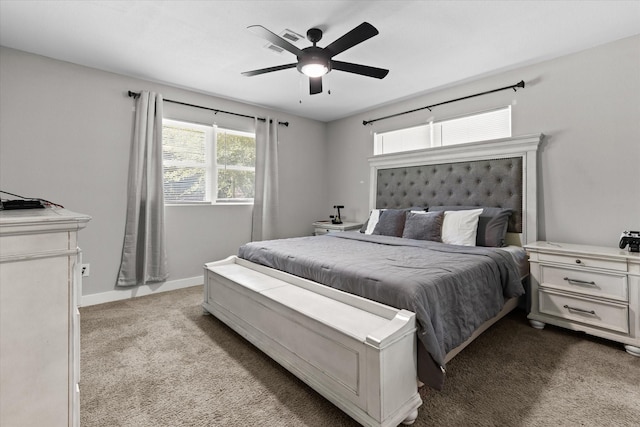 bedroom featuring carpet floors, ceiling fan, and baseboards