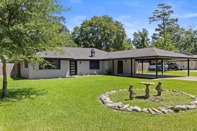 ranch-style home with an attached carport