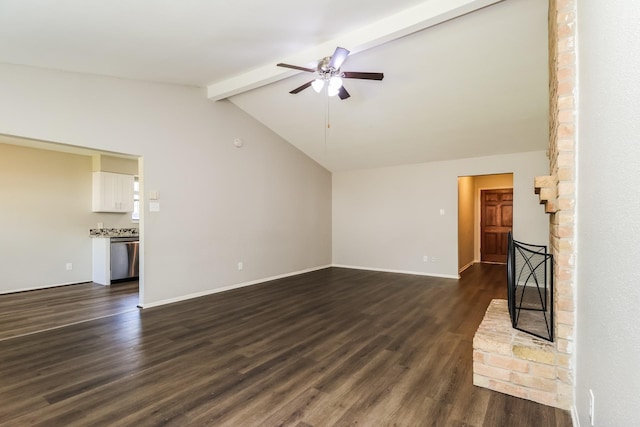 23314 Goodfellow Dr, Spring, TX 77373 - unfurnished living room featuring dark wood-type flooring, a ceiling fan, baseboards, and vaulted ceiling with beams