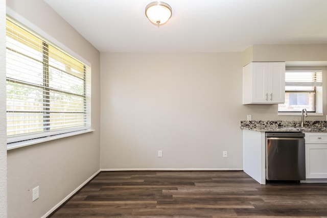 23314 Goodfellow Dr, Spring, TX 77373 - kitchen with stainless steel dishwasher, a sink, dark wood-type flooring, and white cabinets